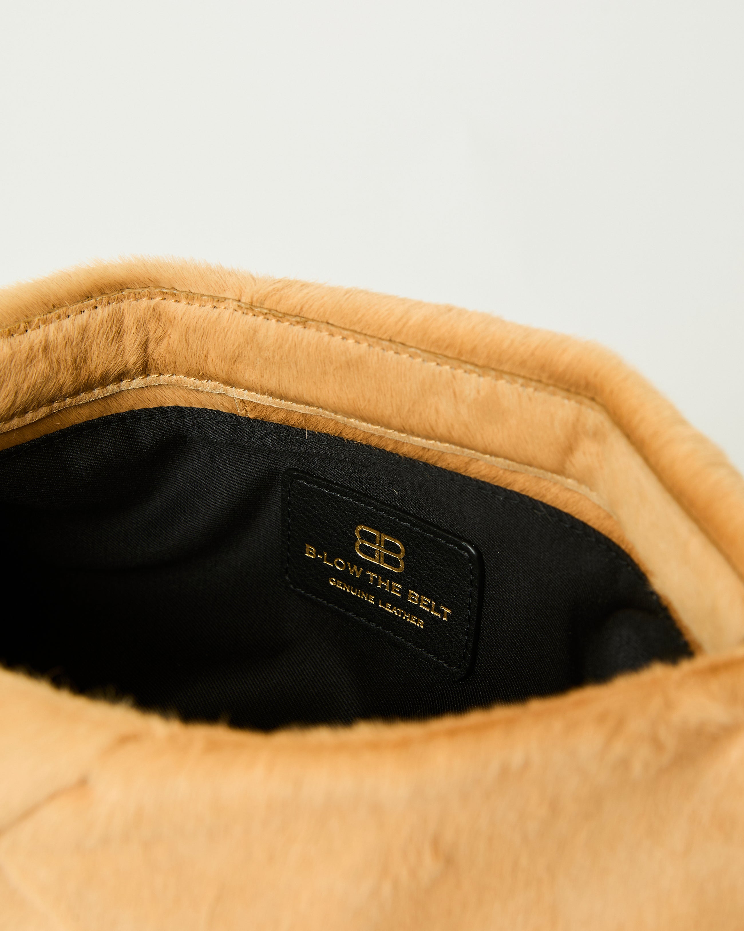 JINO CALF-HAIR CLUTCH - HANDBAGS