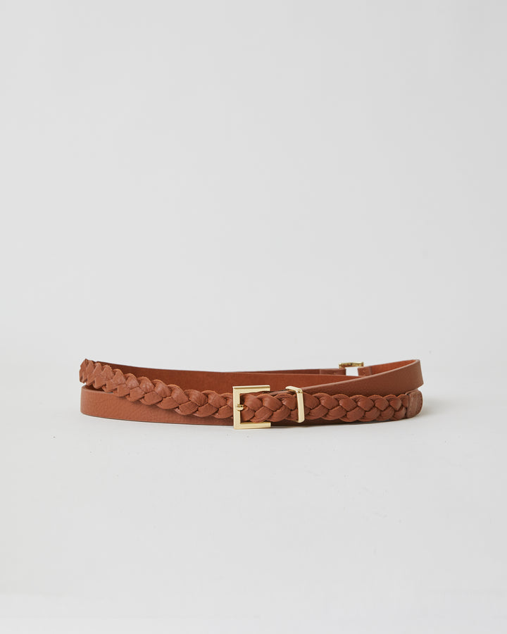 Brandy colored leather belt that wraps around the waist twice. Braided section in the front and on the side. Fastens with a gold square-shaped buckle and keeper.