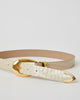 Light sand shiny leather belt with croc-embossed strap. Detailed with shiny gold rounded buckle, keeper, and tip accent. Up close image of the gold hardware details