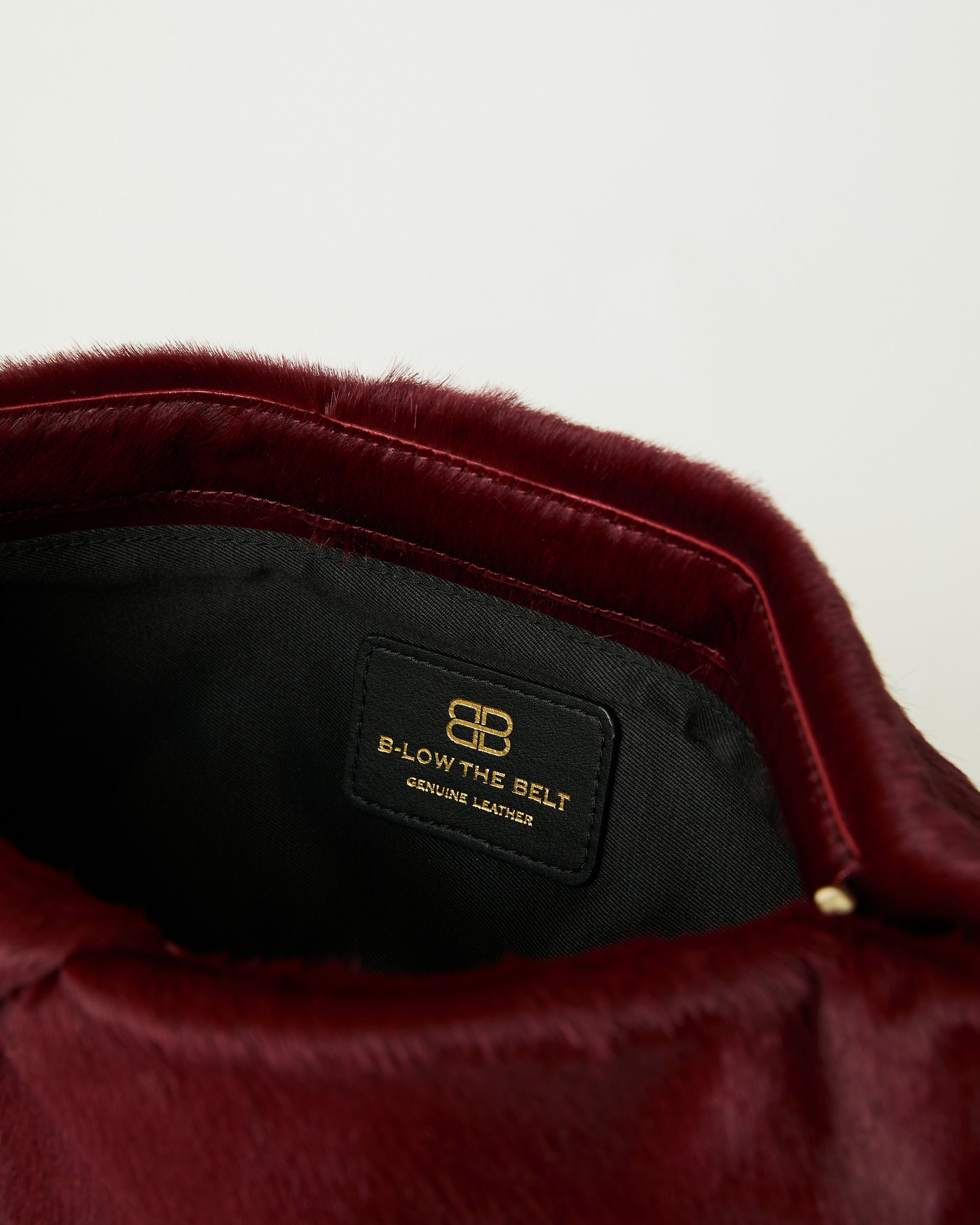 JINO CALF-HAIR CLUTCH