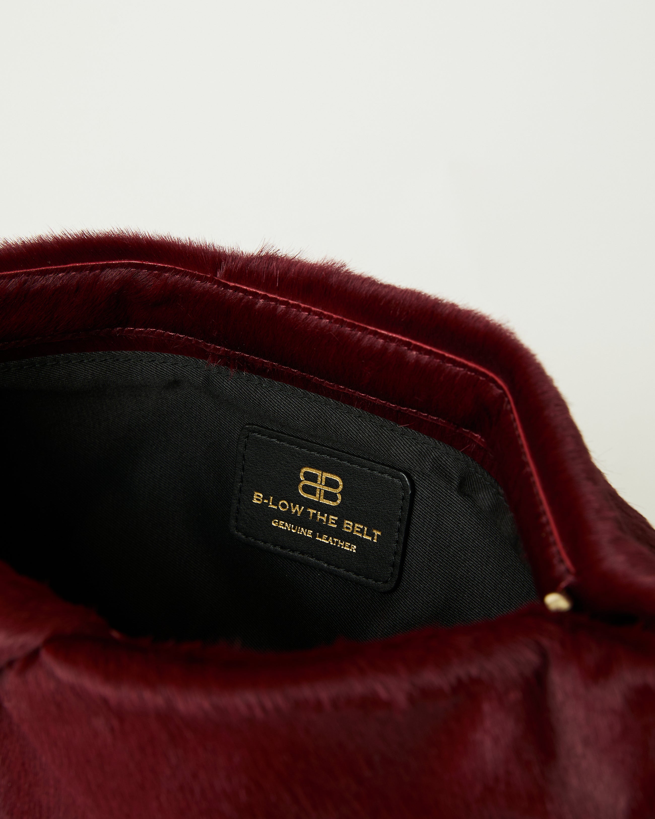 JINO CALF-HAIR CLUTCH