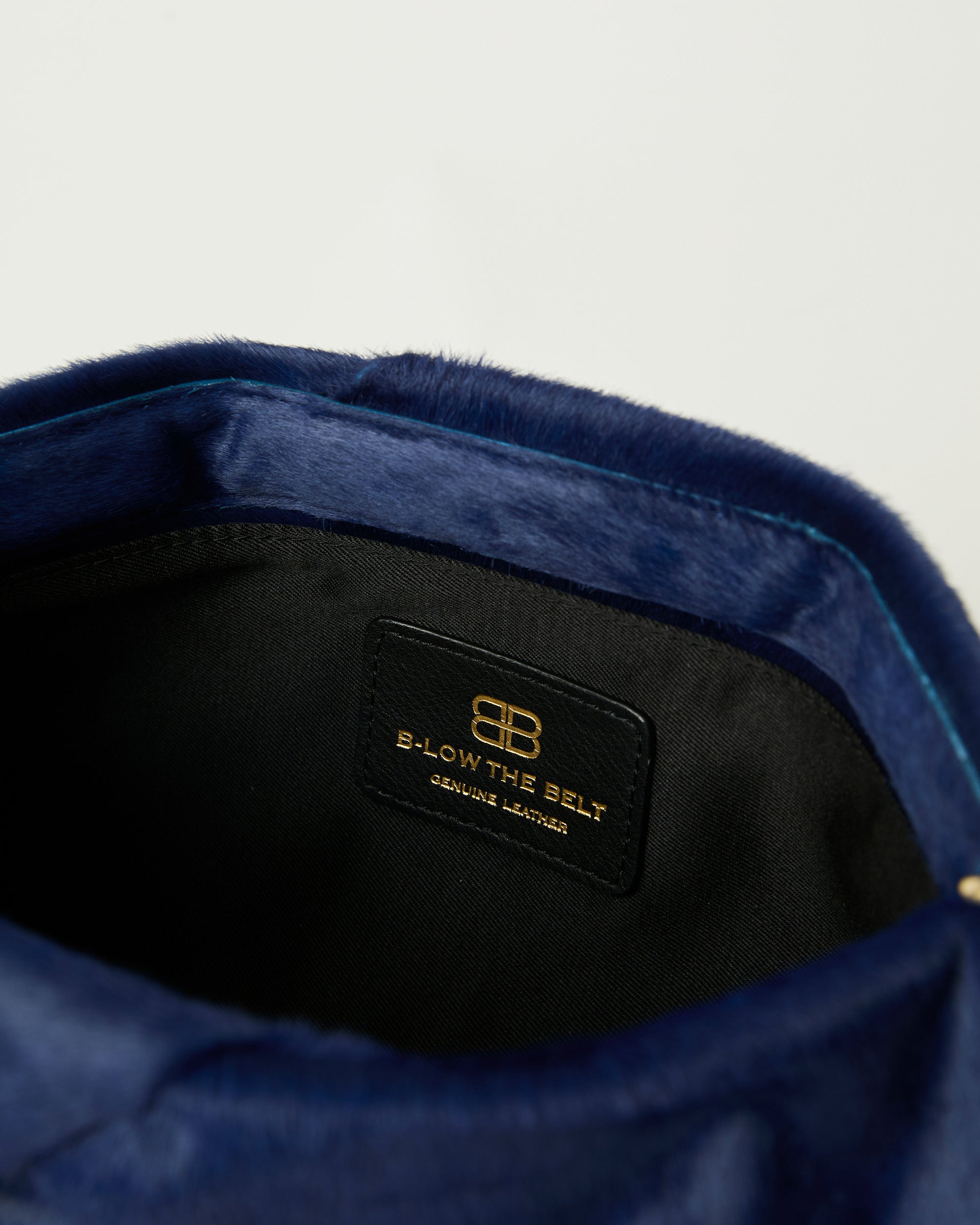 JINO CALF-HAIR CLUTCH