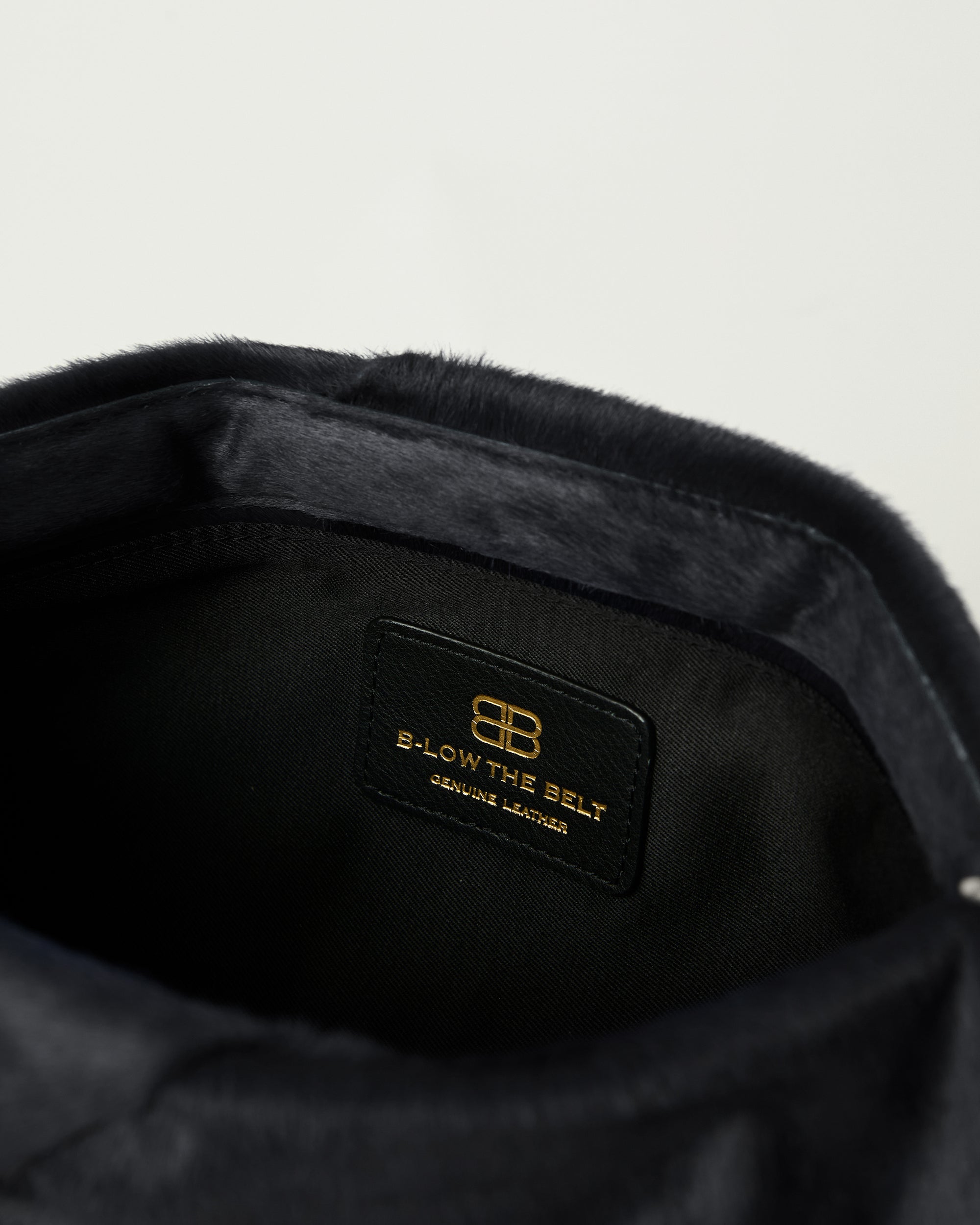 JINO CALF-HAIR CLUTCH