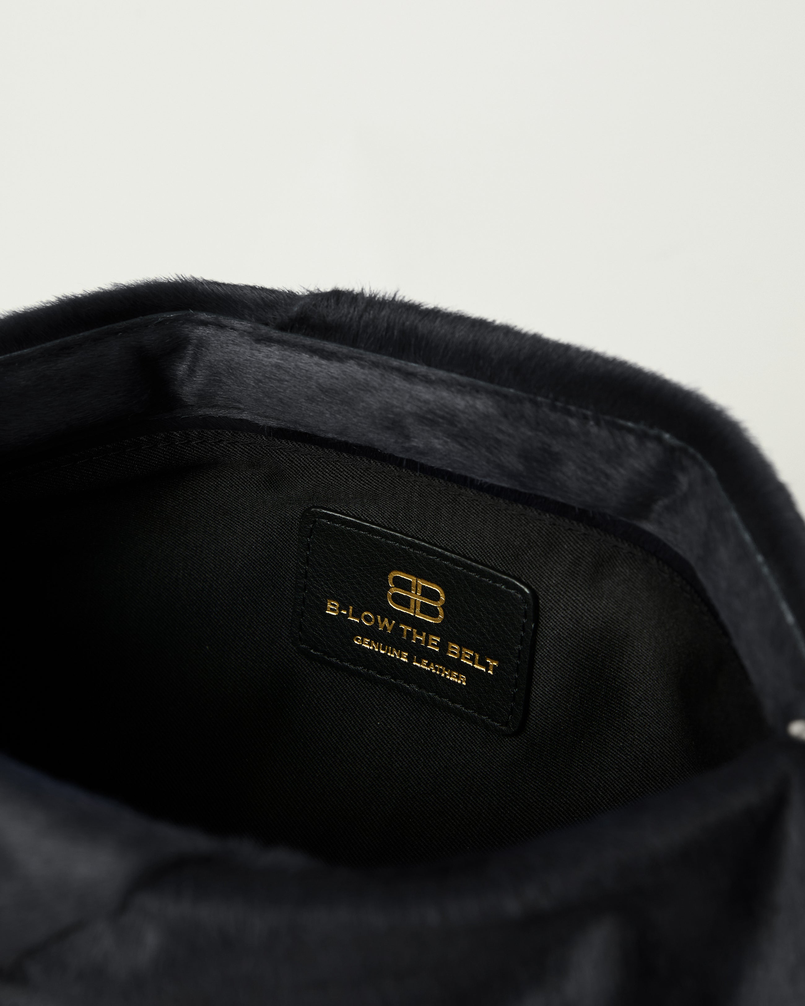 JINO CALF-HAIR CLUTCH