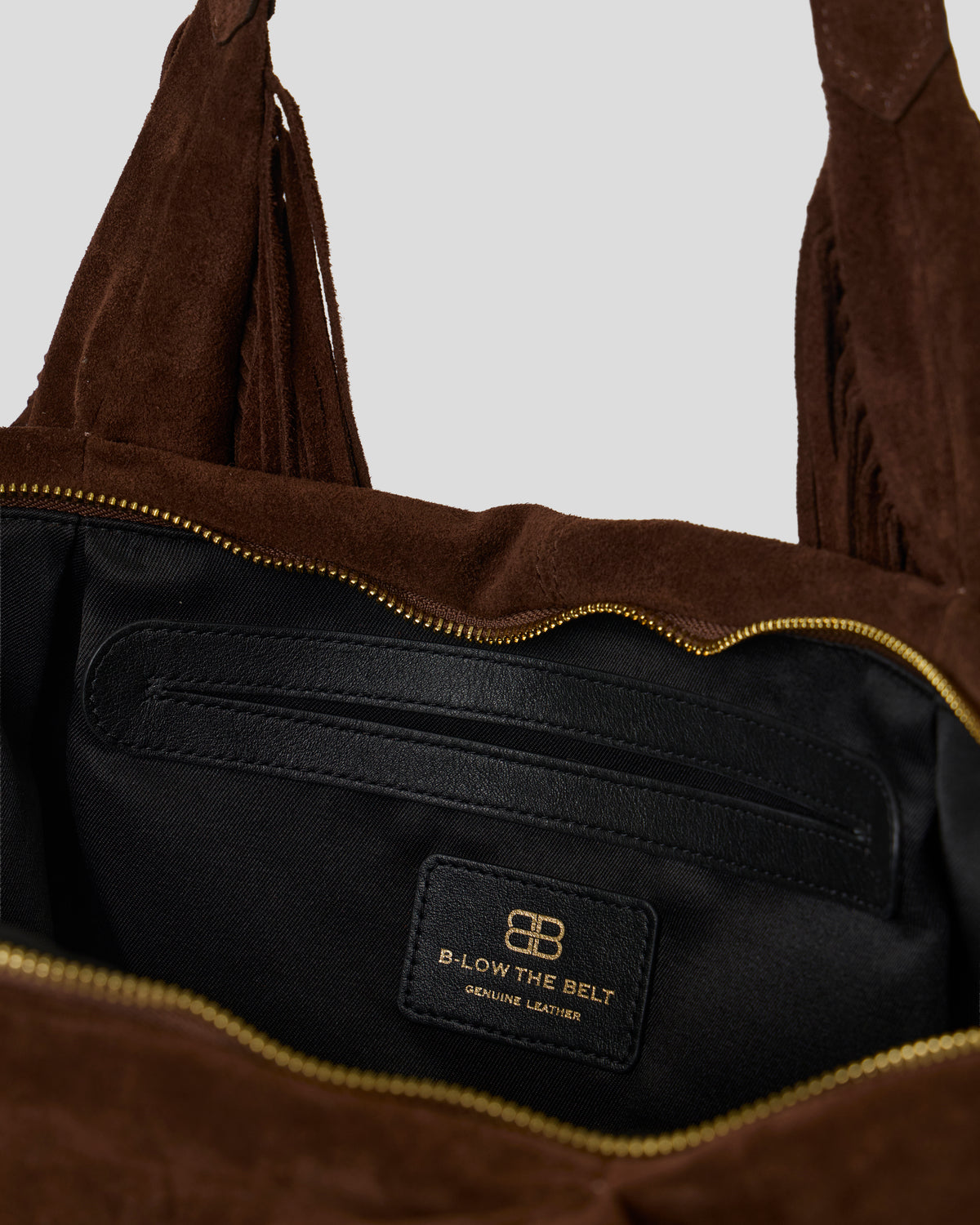 CARTER FRINGE SUEDE BAG - HANDBAGS