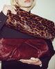 JINO CALF-HAIR CLUTCH - HANDBAGS