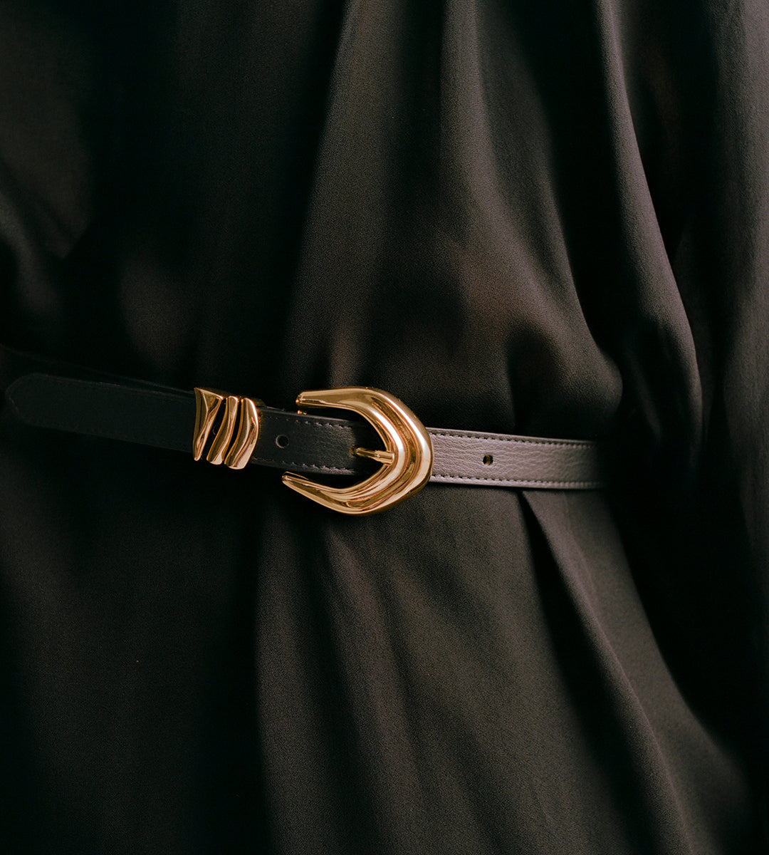 Designer leather belts and foundational fashion accessories