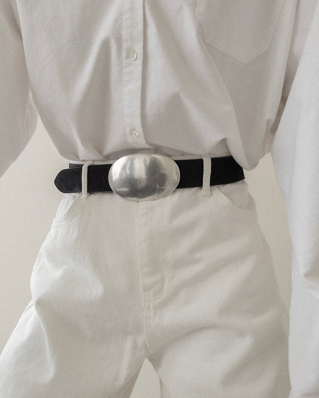 Designer leather belts and foundational fashion accessories