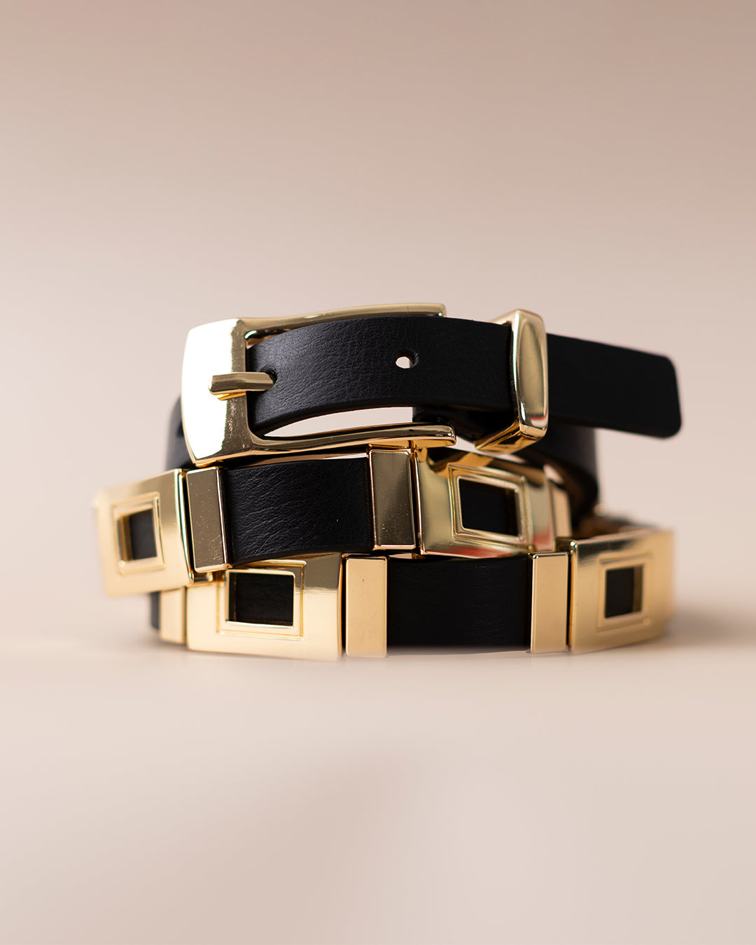 Designer leather belts and foundational fashion accessories
