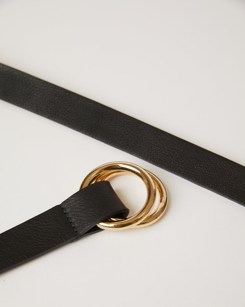 skinny black belt with double gold ring buckle and leather strap.