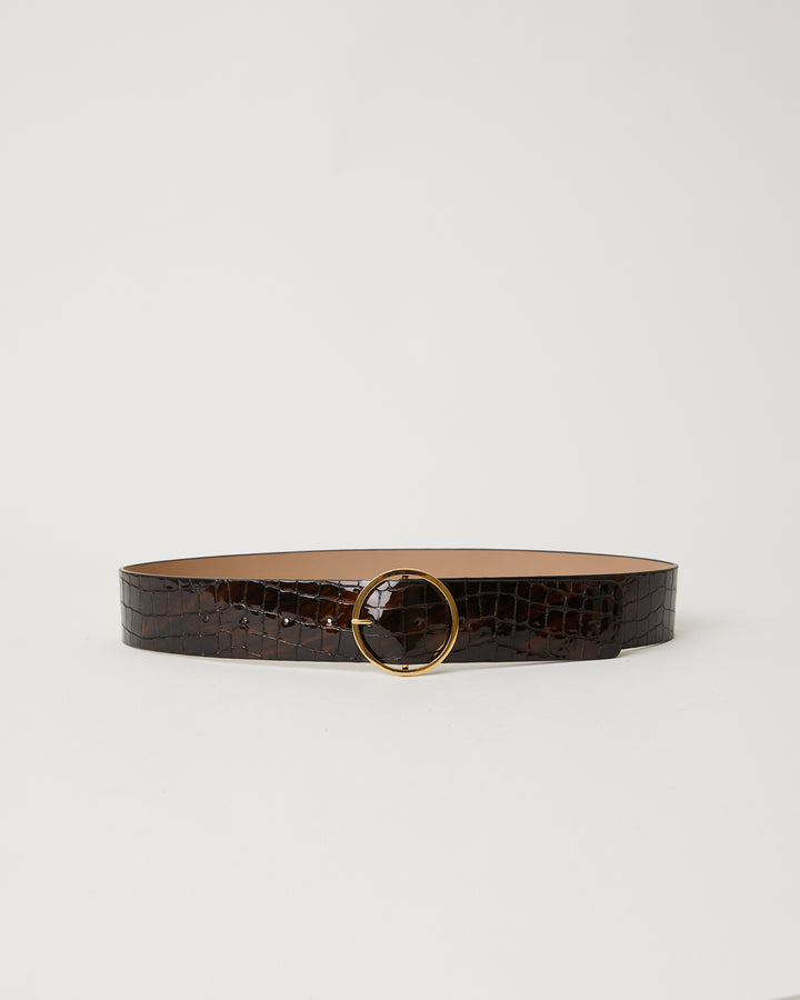 Brown bronze colored patent croc embossed leather belt with simple round gold buckle.