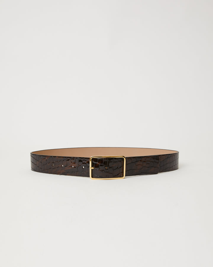 Bronze colored shiny leather belt with croc-embossed finish. Fastens with simple gold triangle shaped buckle.
